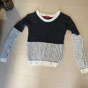 Black and white knit sweater size s.